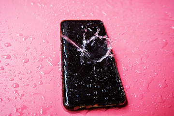 Smatrphone and water drops. Idea for smartphone cleaning, waterproof, film protection, insurance, damage phone of rainy day.