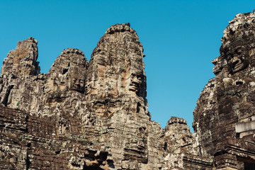Faces of Bayon temple in Angkor Thom, Siemreap, Cambodia. The Prasat Bayon is a richly decorated Khmer temple at Angkor , ancient architecture in Cambodia