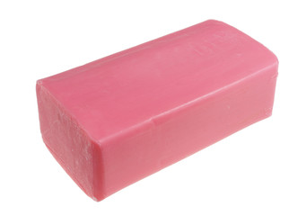 Rectangular piece of new pink soap with strawberry smell  isolated