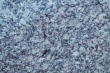 kaleidoscope pattern on a polished granite slab