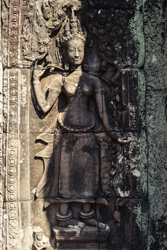 Ancient Khmer carving bas-relief. Wall of Bayon Temple, Angkor Thom, Siem Reap, Cambodia