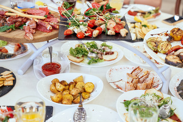 spanish tapas and sangria on wooden table, top view