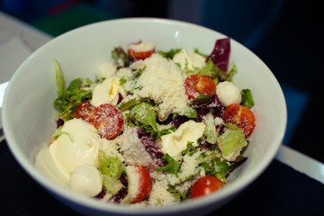 Healthy balanced vegetarian food concept, buddha bowl salad. Tomato, cheese salsa, mixted salad and mozzarella, vegetable appetizer plate - Image