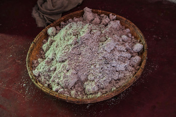 Coconut chips in a large plate. Food and products in Asia. Stock photo