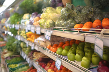 Supermarket in East Asia. Fruit on the counter of the store in Sri Lanka and India. Vegetarian green theme