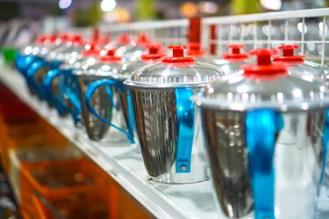 Different dishes and pans in a supermarket in Asia. Stock photography background