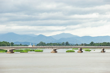Fototapeta na wymiar Long bridge cross the rivers in the north of Thailand