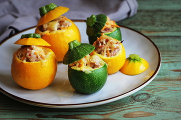 Baked round zucchini stuffed with minced meat, vegetables, and cheese
