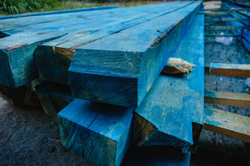 blue boards lying on top of each other. building construction concept