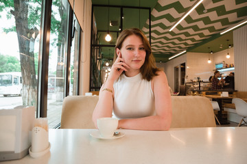 girl works at the laptop