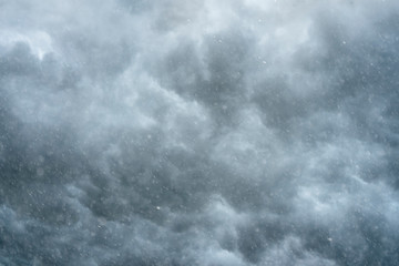Rain clouds on the sky with rain fall.