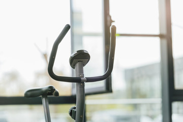 selective focus of modern elliptical machine at sports center