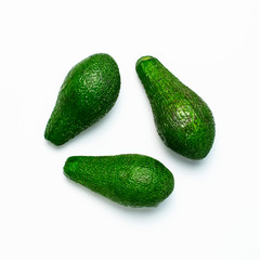 Ripe fresh avocado isolated on white background with shadow top view Flat lay copy space. Fruits Healthy food concept, diet, healthy lifestyle, organic avocado