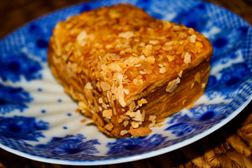 fresh puff pastry sprinkled with grated nuts