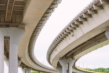 Obraz premium The construction of the road bridge. Bottom view. Architecture concept