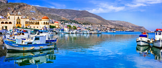 Scenic traditional greek isalnds. Kalymnos island in Dodecanese. Pothia town and harbor with fishing boats. Greece travel