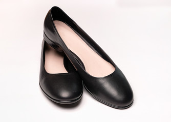 Female black leather ballet shoes