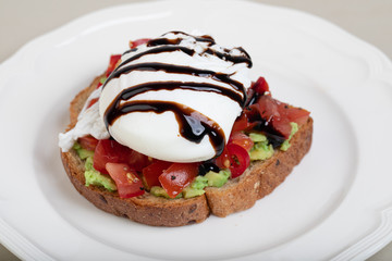 Poached egg on rye toast