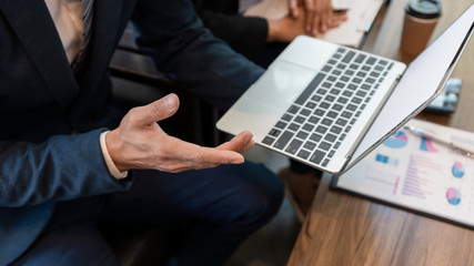 business people and coworker colleagues discussing explanations about week working plan project cooperating in modern coworking office.
