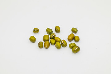 Mung bean seeds have long been used as food for humans, green beans, isolated on a white background.