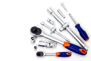 A set of tool heads for loosening screws, bolts and nuts. Ratchet screwdriver. White background