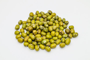 Mung bean seeds have long been used as food for humans, green beans, isolated on a white background.