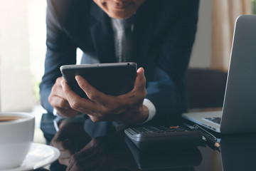 Businessman using tablet