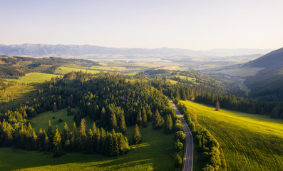 Road going through forests and villages of the Liptov region in Slovakia