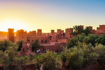 Sunset above ancient city of Ait Benhaddou in Morocco - obrazy, fototapety, plakaty