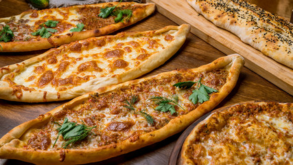 Assorted Turkish foodset.  pide with meat , pide with cheese, pide mix, lachmajun - obrazy, fototapety, plakaty