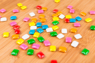 Rounded square unchewed multicolored bubble gum pieces