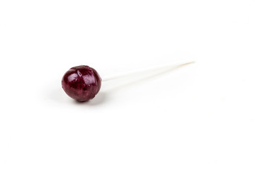Single colorful candy sucker on a stick