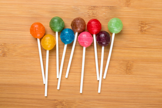 Colorful arrangement of candy suckers on sticks