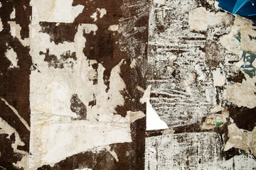 Old wall with remains of paper
