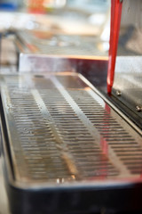 Stainless metallic tray and cap of mini sink of a soda drinks dispenser machine of a bar or...