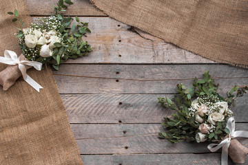 Rustic background with bouquets and burlap