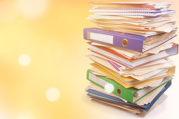 File folders with documents on white background