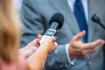Fototapeta premium Media Interview. Journalists Interviewing Politician or Businessman