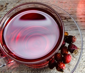 Fruit berry tea in the cup served on table