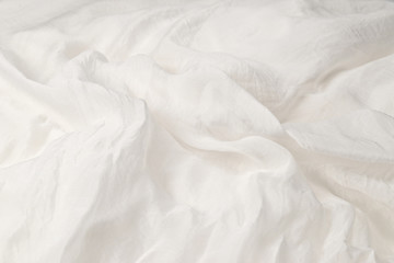 Soft smooth white silk fabric background. Fabric texture.