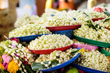 Pile of jasmine garland for praying to successful in life at Wat Phra That Doi Kham, Chiangmai, Thailand