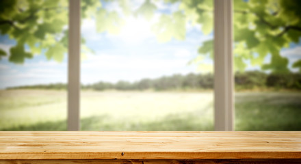 Desk of free space for your decoration and summer background of window 