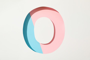 Two color letter O on white background, space for text