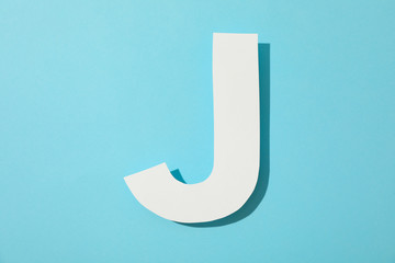 White letter J on color background, space for text