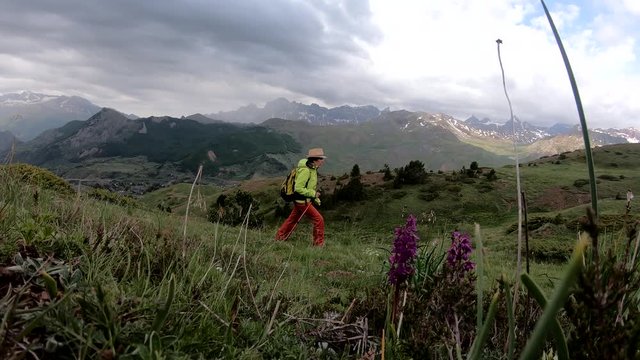hiker woman with view of Tena Valley in The Pyrenees, Formigal,  Huesca, Spain