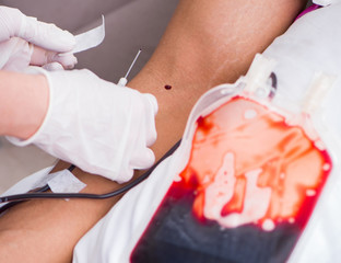 Patient getting blood transfusion in hospital clinic