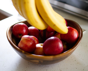 bowl of apples and bananas