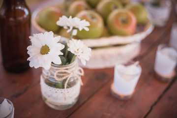 Obraz na płótnie Canvas bouquet of flowers on wooden table