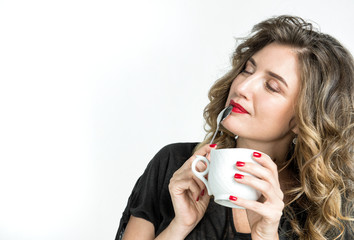 Beautiful girl cup of coffee Young woman enjoying drink