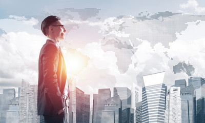 Concept of business success and control with confident boss against cityscape background